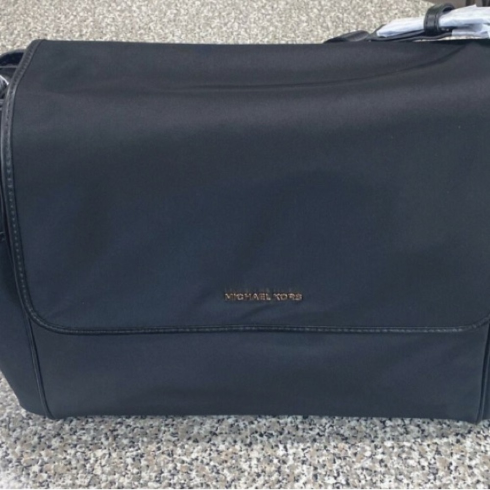 KORS Michael Kors Black Baby Bag with Messenger Style and Flap Closure